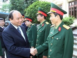 Phó Thủ tướng Nguyễn Xuân Phúc đến thăm Viện kiểm sát và Tòa án Quân sự TW - ảnh 1